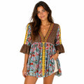 Boho tuniek dames met kleurrijke patchwork print gedragen door model tegen witte achtergrond