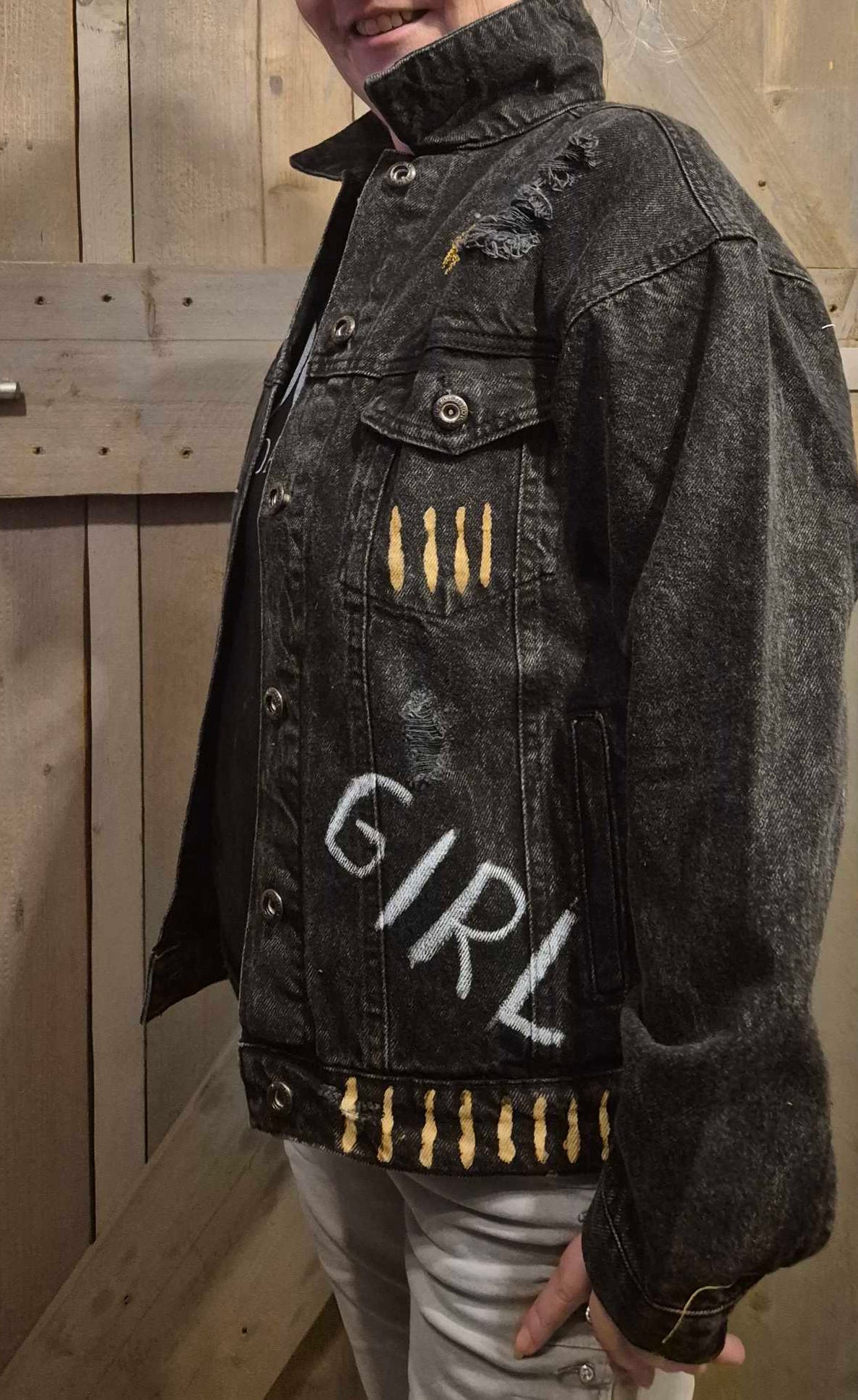 Handmade upcycled denim jacket side view