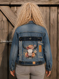 One of a Kind upcycled denim jasje met buffelschedel en bloemen kunstwerk op de achterkant, handgemaakt door Old New Atelier.