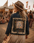 Boho festival model draagt one of a kind upcycled denim jacket met patchwork achterkant