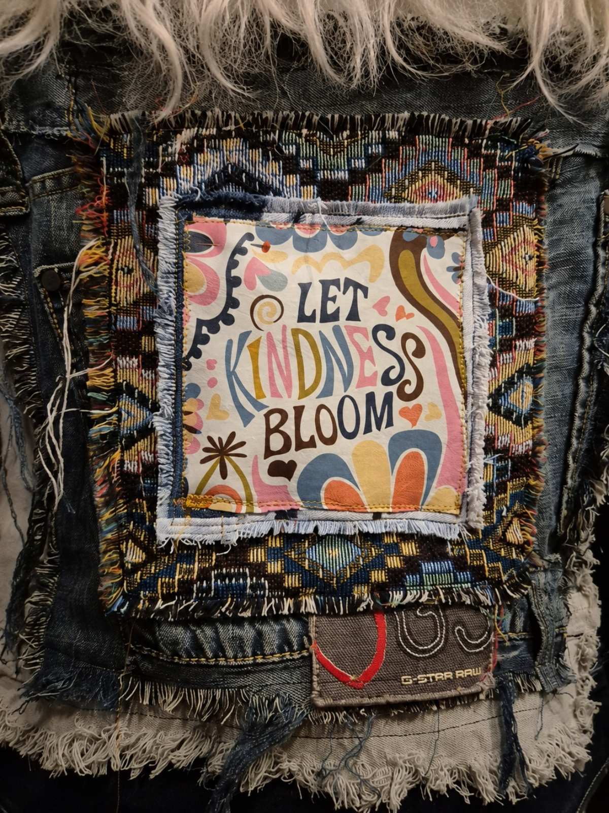 Let Kindness Bloom – One of a Kind Upcycled Denim Jacket