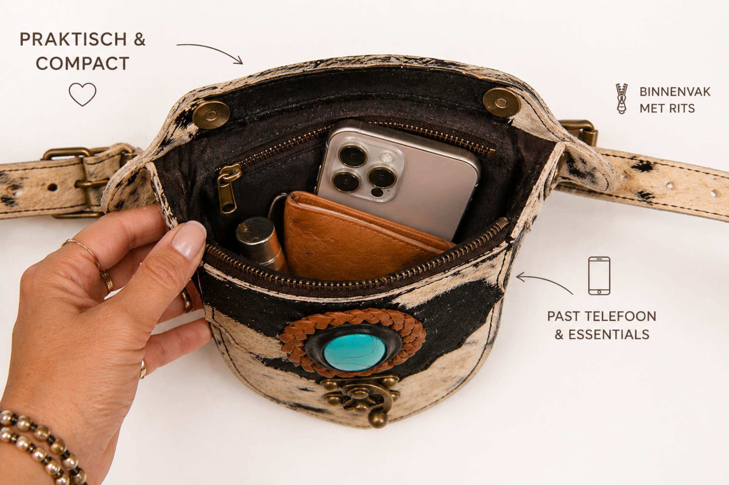 Binnenkant heuptas met telefoon en essentials