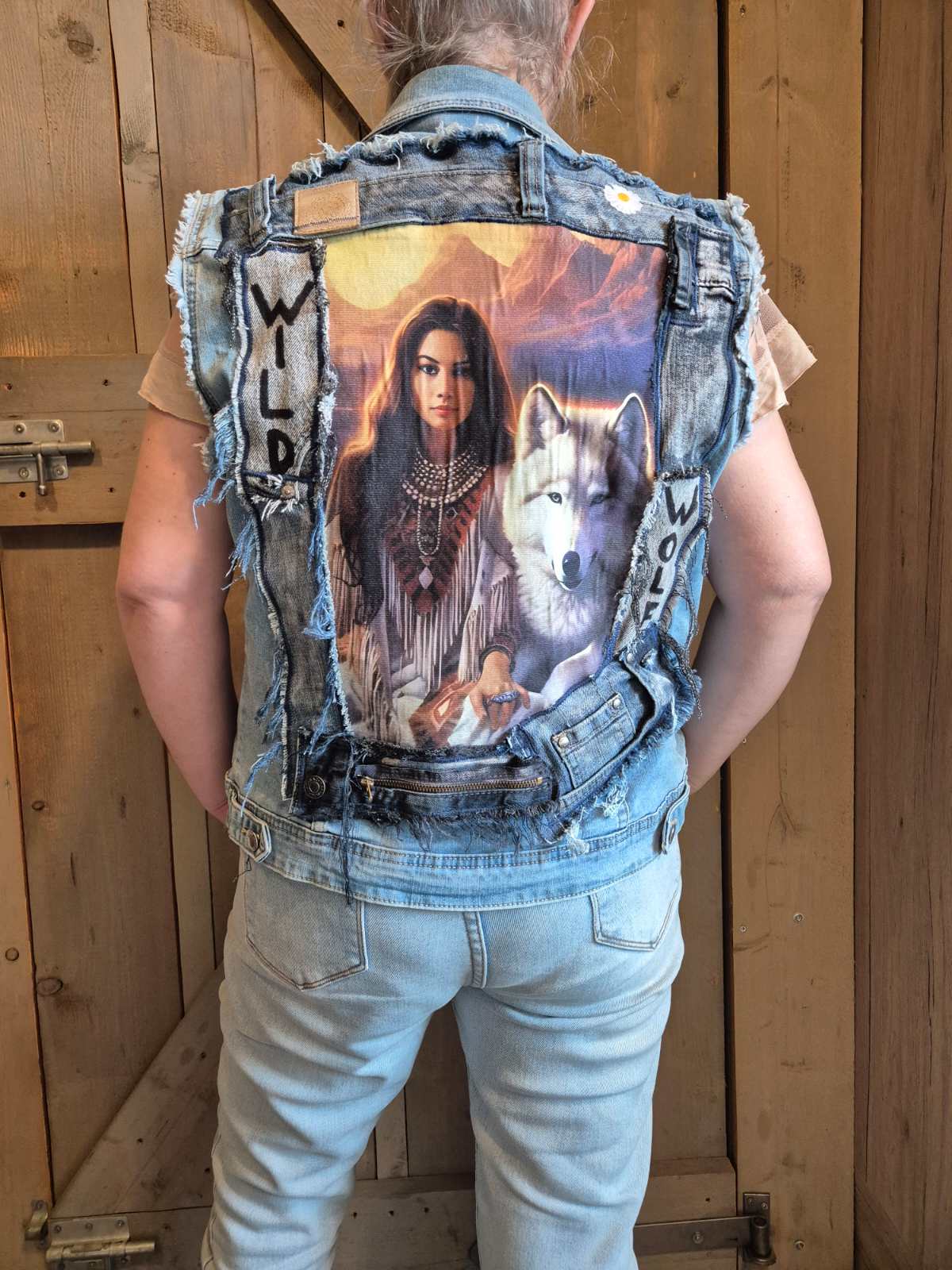 One of a kind upcycled denim vest with wolf artwork and handmade boho patchwork details by Old New Atelier