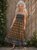 Boho 2-in-1 jurk gedragen als lange strapless jurk met smokband en maxi lengte.