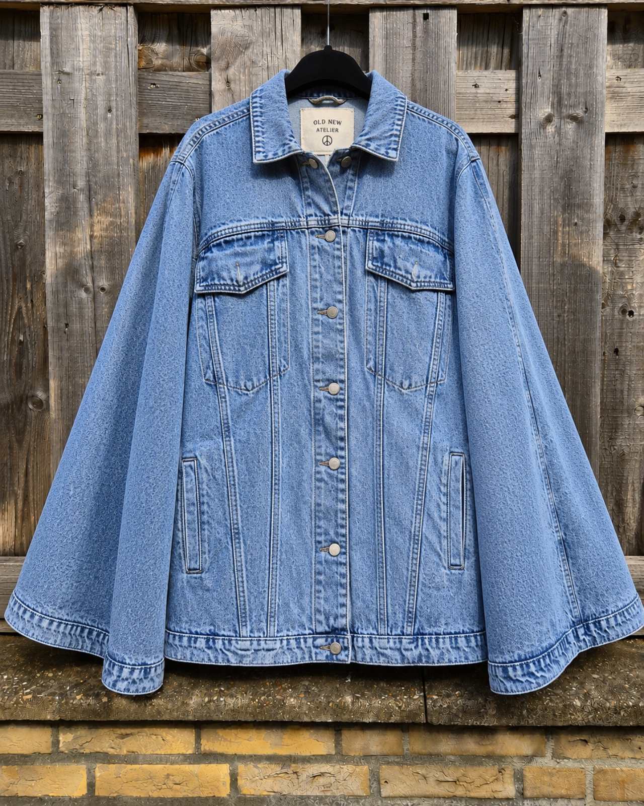 Voorkant oversized denim poncho one of a kind